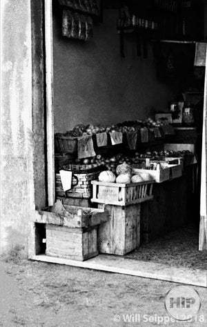 A vacant storefront in Italy, 1940s.