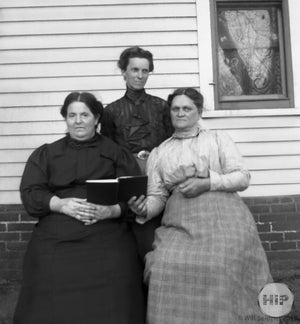 Three women looking in three directions, from the Fred Bodin collection.
