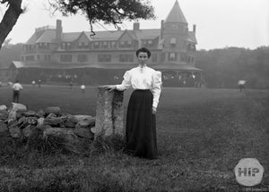 A sharp woman, an old hotel, by Clarence Trefry.