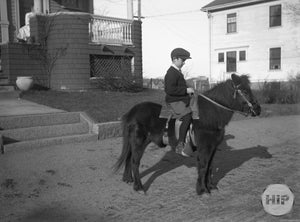 Snapshot of a boy and his pony by Alice Curtis of Gloucester, MA.