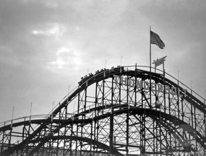 Thunderbolt Roller Coaster at Coney Island with Steeplechase Park Pavilion of Fun in the Background