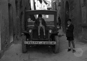 Kids on a Jeep, by George Sakata.