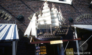 Vintage Ship Model above Shop Entrance